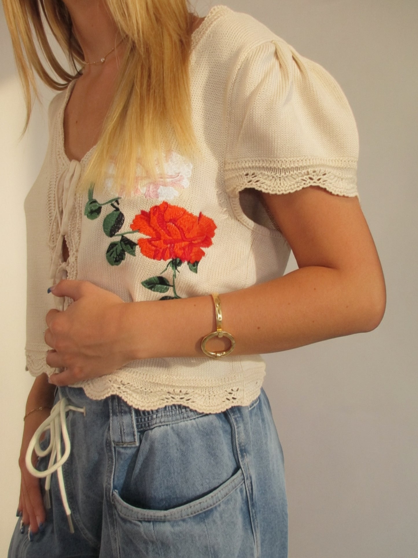 Floral self-tie knit top